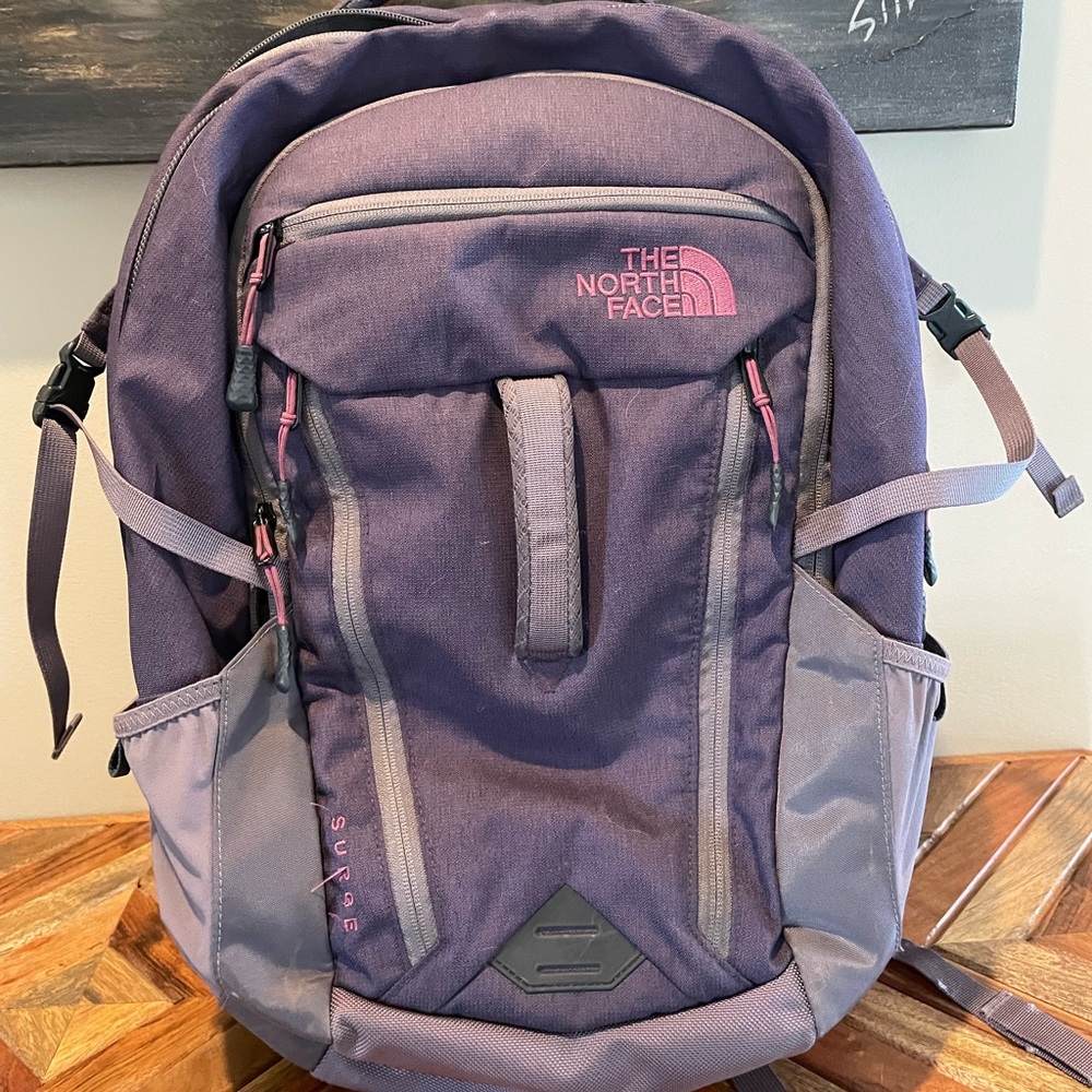 Surge North Face Backpack. Purple & grey color with pink accents.
